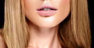 sensual glamour portrait of beautiful blond woman model lady with fresh daily makeup with nude lips color and clean healthy skin