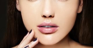 High fashion look.glamor closeup beauty portrait of beautiful   Caucasian young woman model with nude makeup   with perfect clean skin
